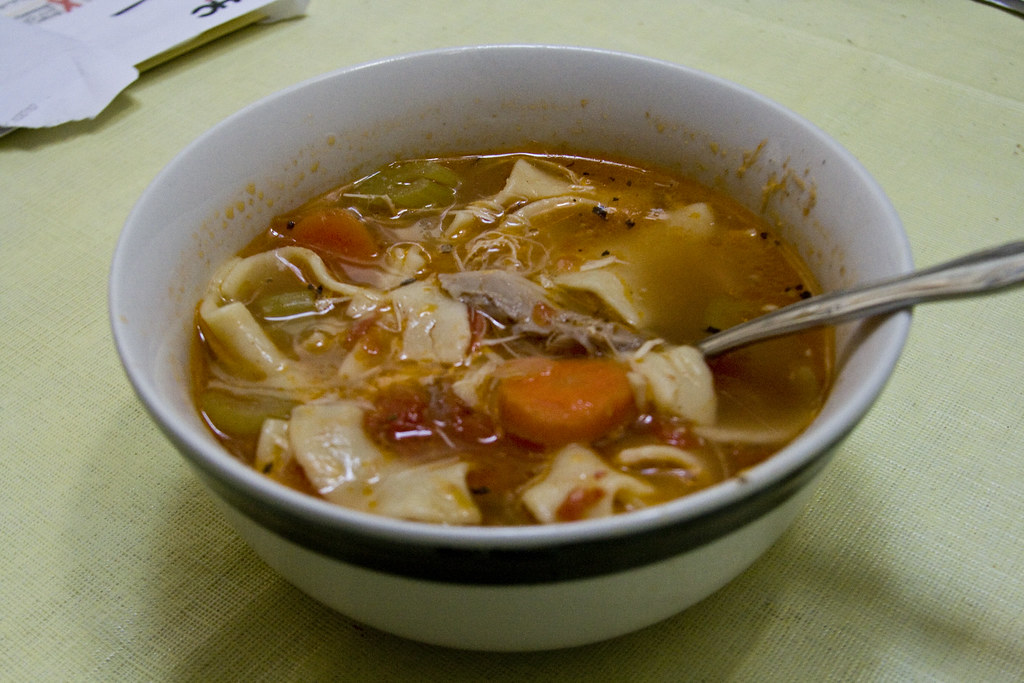 Chicken noodle soup with quail egg